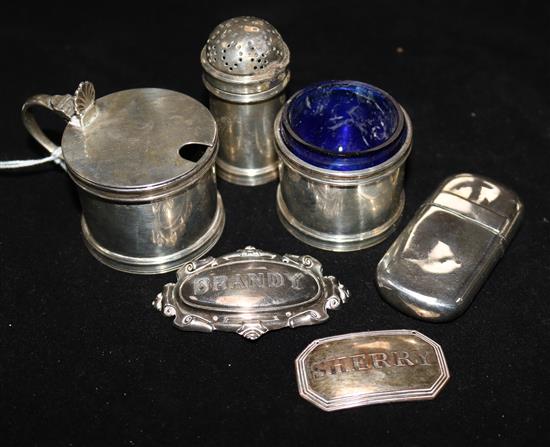 Three silver condiments and three other items.
